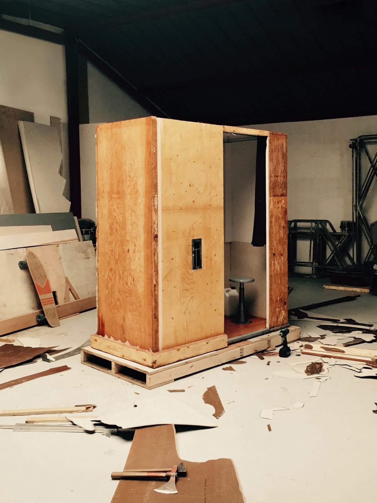 wooden photo booth in a workshop