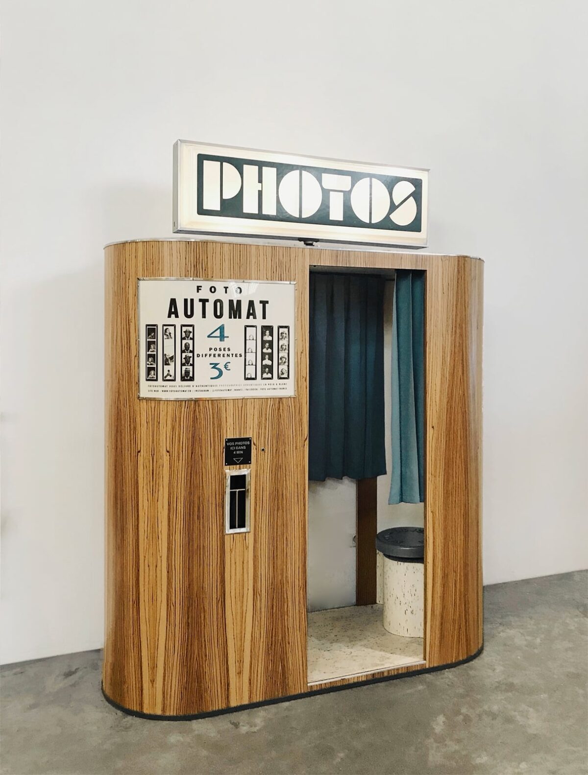 rounded photo booth in natural wood 