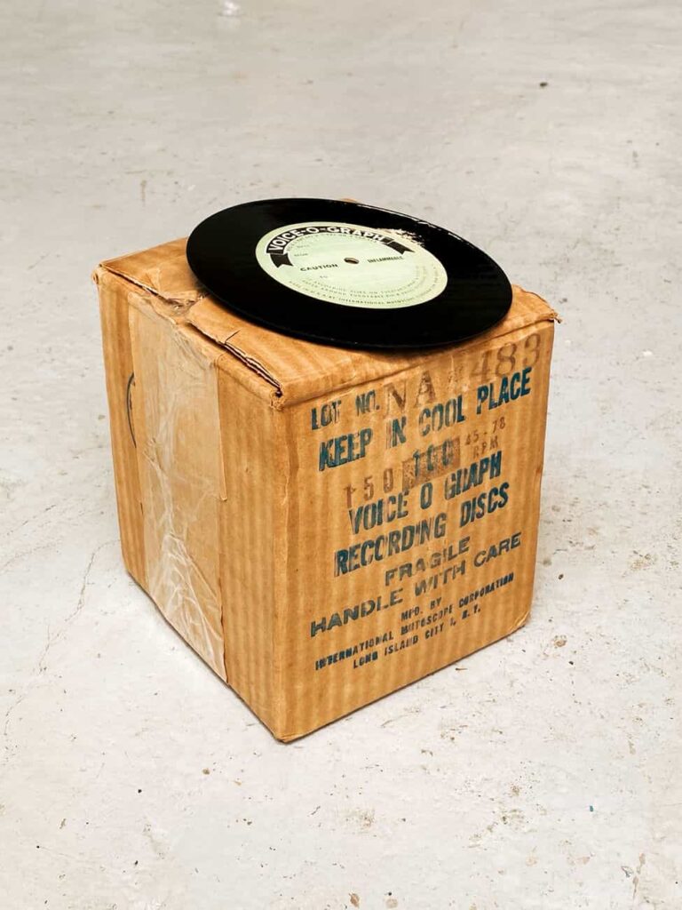 vinyl record on a cardboard box