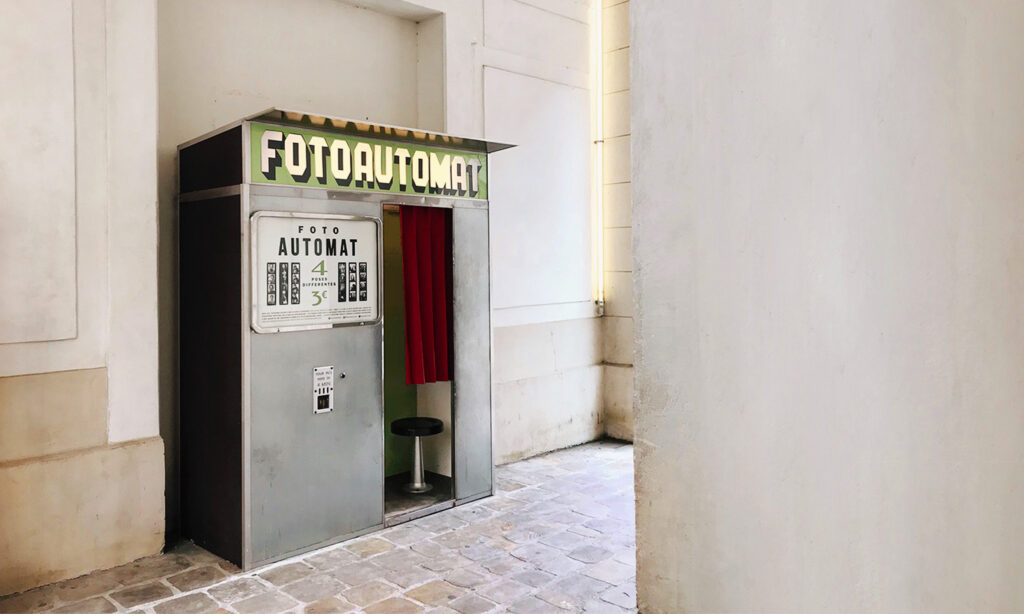 vintage metal photo booth installed at Centquatre in Paris